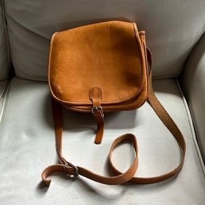 Raw brown leather purse orangey brown cross body adjustable silver buckles
